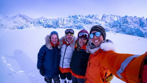 4-personnes-femme--doudoune-orange-glacier